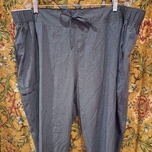 Size 3 XL grey scrub pants with pockets and string closure